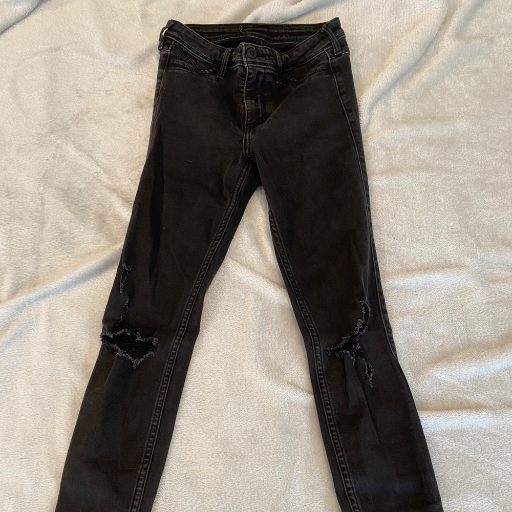 Black jeans with rips in the knees!